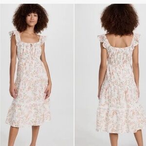 White dress with orange flowers